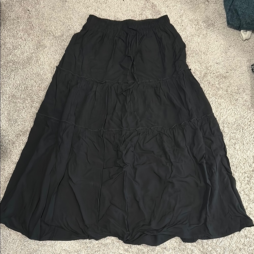 Black Maxi Skirt-size S. Never worn. Elastic band top with tie. Tiered details.